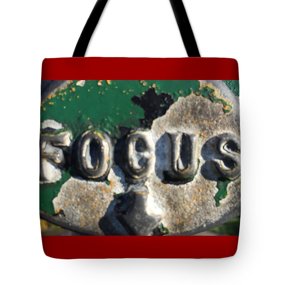 Focus Tote Bag featuring the photograph Focus One by Sara Young