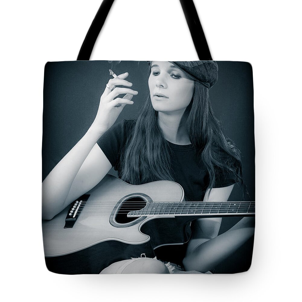  Tote Bag featuring the photograph Folk Singer by Rikk Flohr