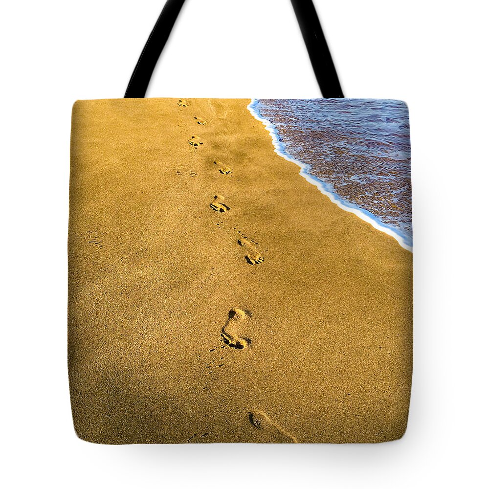 Hawaii Tote Bag featuring the photograph Footprints in the Sand by Bob Mintie
