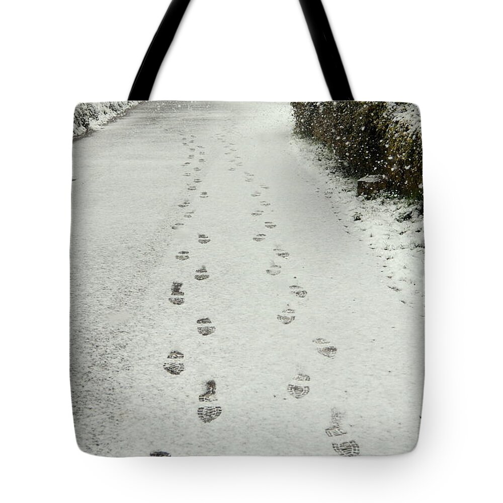 Footsteps Tote Bag featuring the photograph Footsteps by Andy Thompson