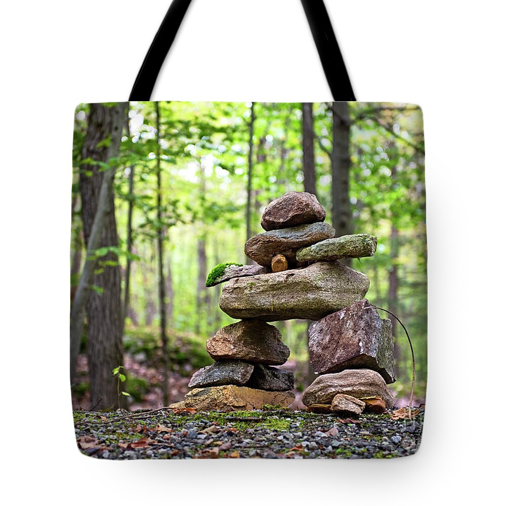Nina Stavlund Tote Bag featuring the photograph Forest Inukshuk by Nina Stavlund