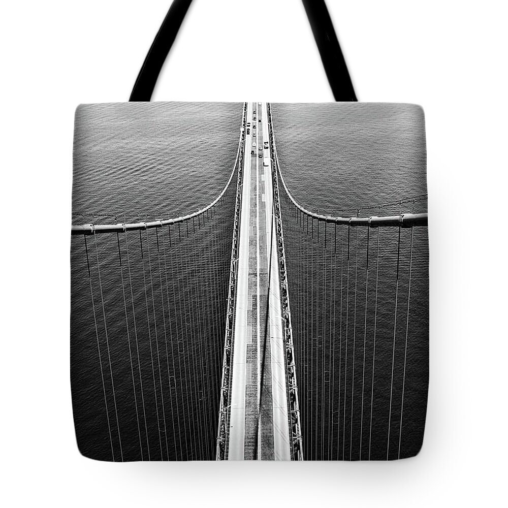 Mackinac Bridge Tote Bag featuring the photograph From The Top by Jackson Pearson