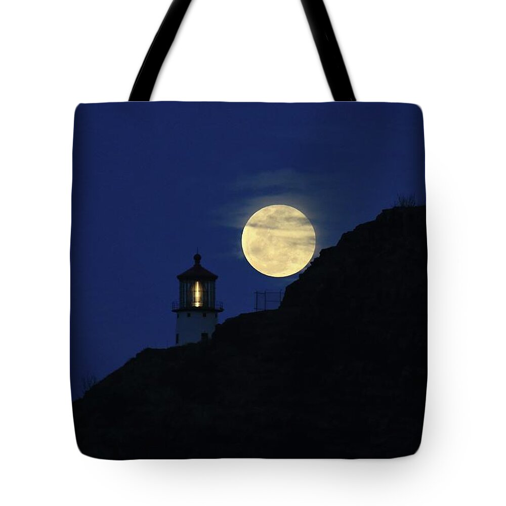 Photosbymch Tote Bag featuring the photograph Full moon over Makapu'u Light by M C Hood