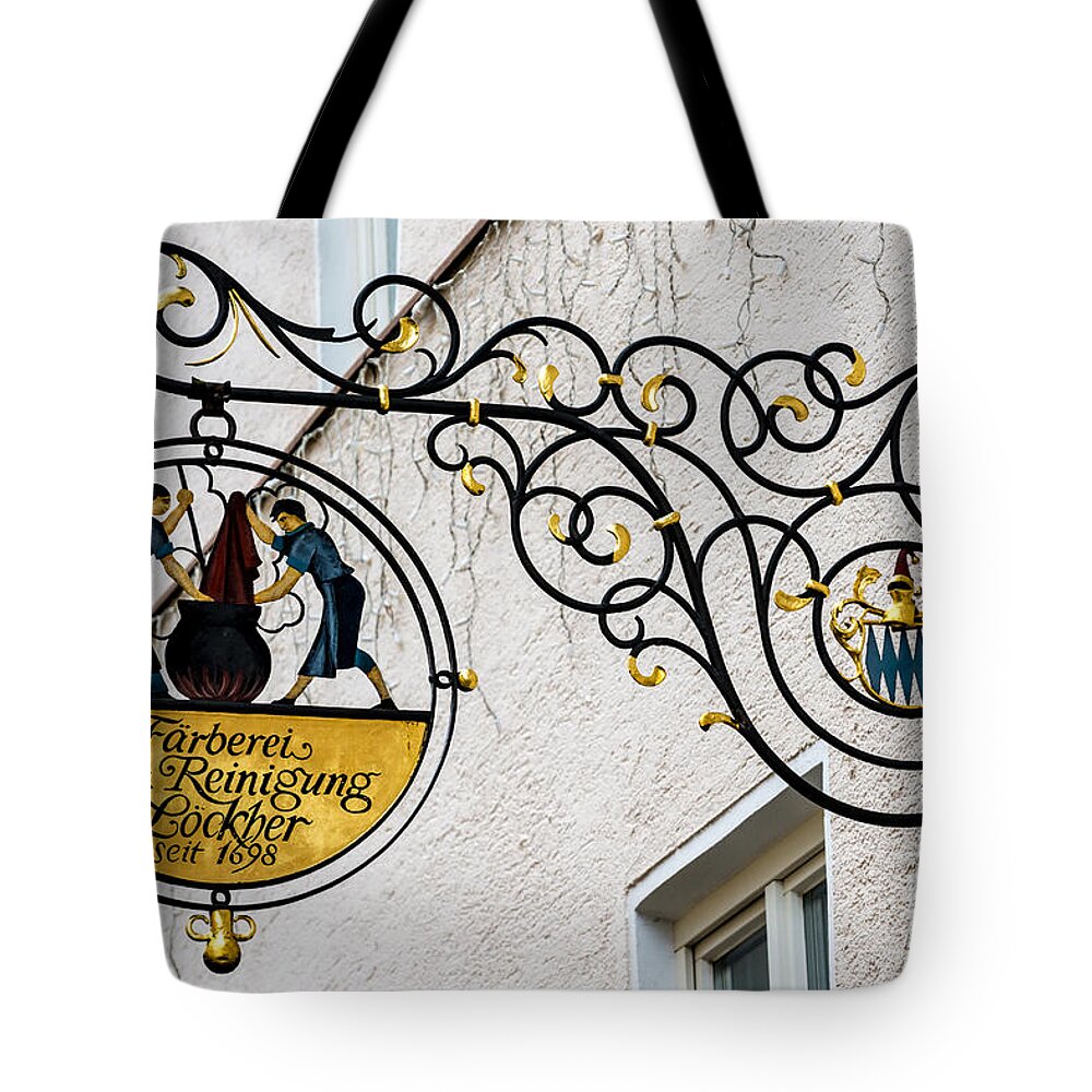 Bavaria Tote Bag featuring the photograph Fussen Old Town Merchant Sign - Germany by Gary Whitton