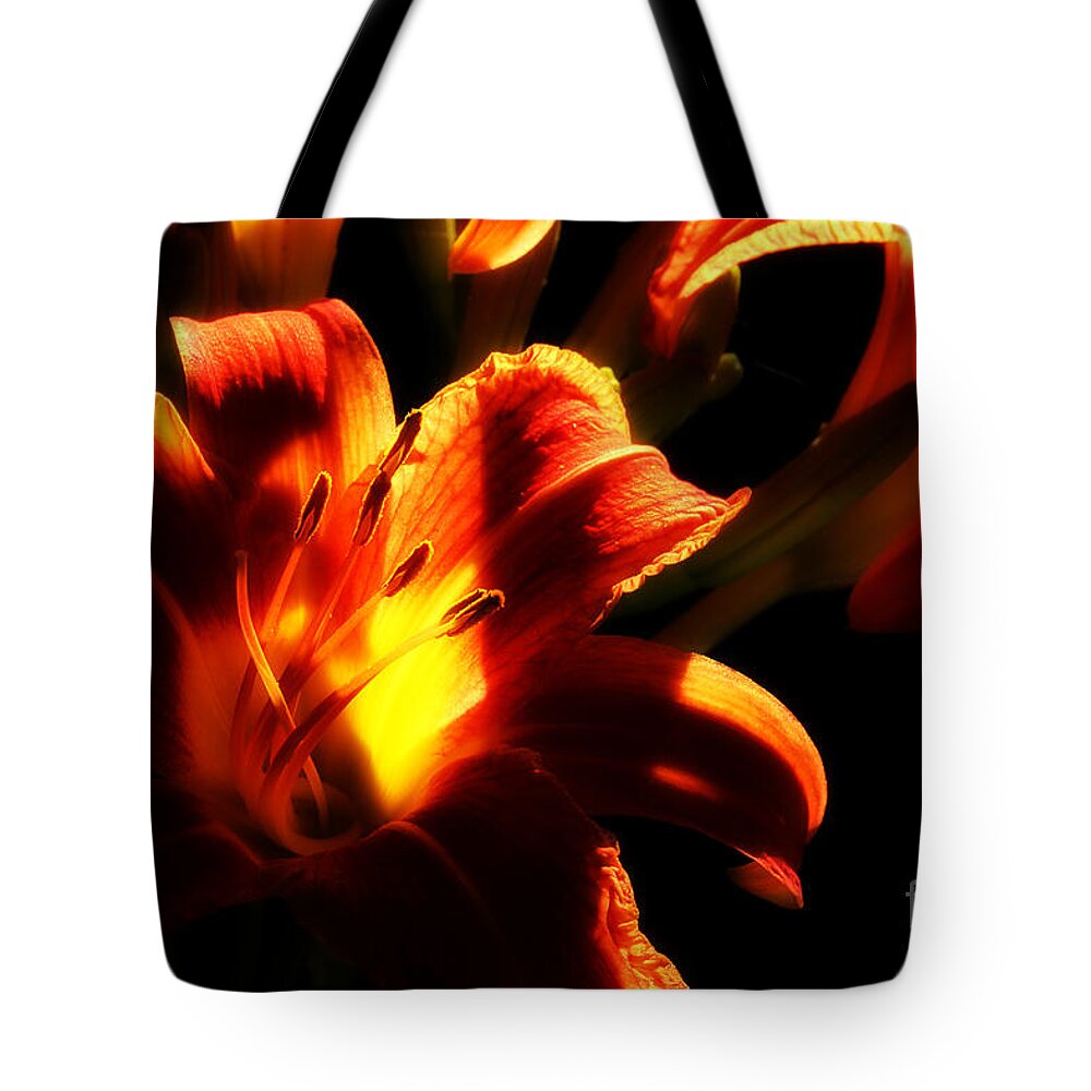 Day Lilies Tote Bag featuring the photograph Garden Flames by Michael Eingle