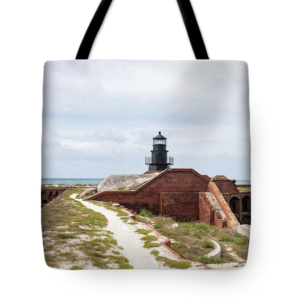 Photosbymch Tote Bag featuring the photograph Garden Key Light and Fort Jefferson by M C Hood