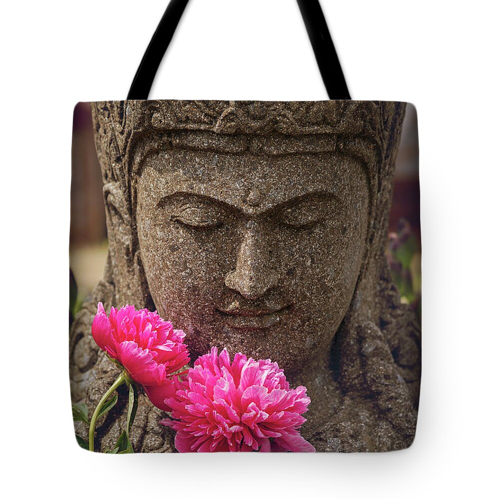 Concrete Tote Bag featuring the photograph Garden statue decorative head by Sophie McAulay