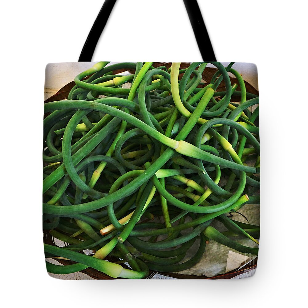 Garlic Tote Bag featuring the photograph Tender Garlic Stems by Dee Flouton