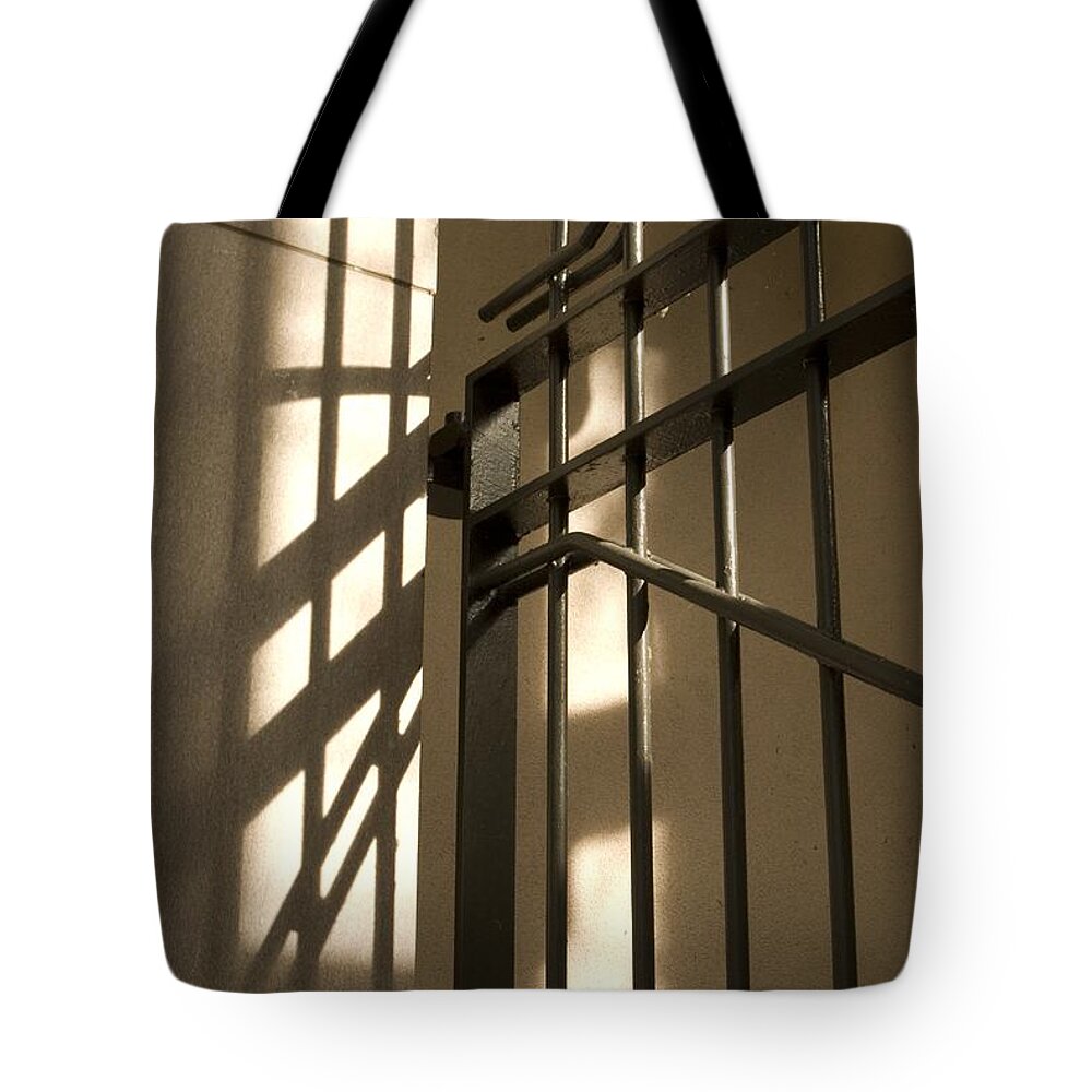Lines Tote Bag featuring the photograph Gate shadow by Sara Stevenson