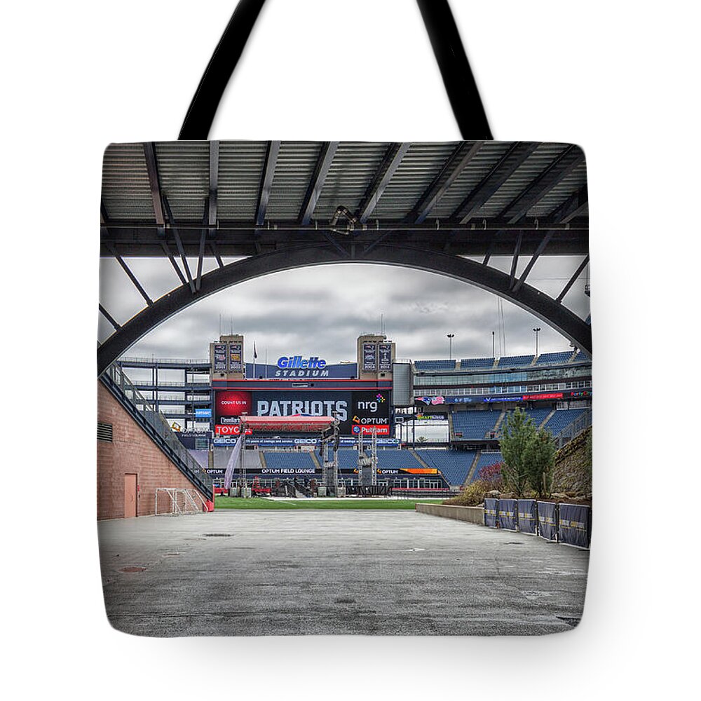 Patriots Tote Bag featuring the photograph Gillette Stadium And The Four Super Bowl Banners by Brian MacLean
