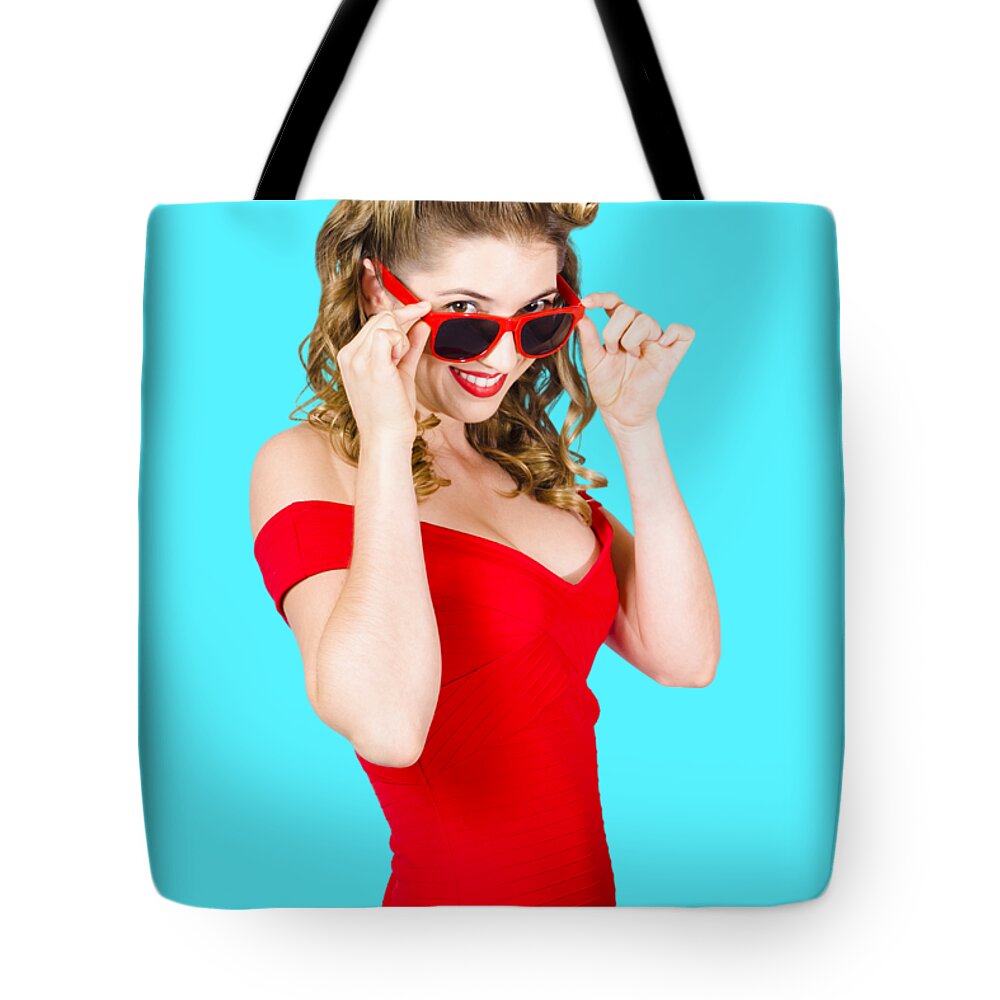 Sunglasses Tote Bag featuring the photograph Girl adjusting glasses to flashback a 1950s look by Jorgo Photography