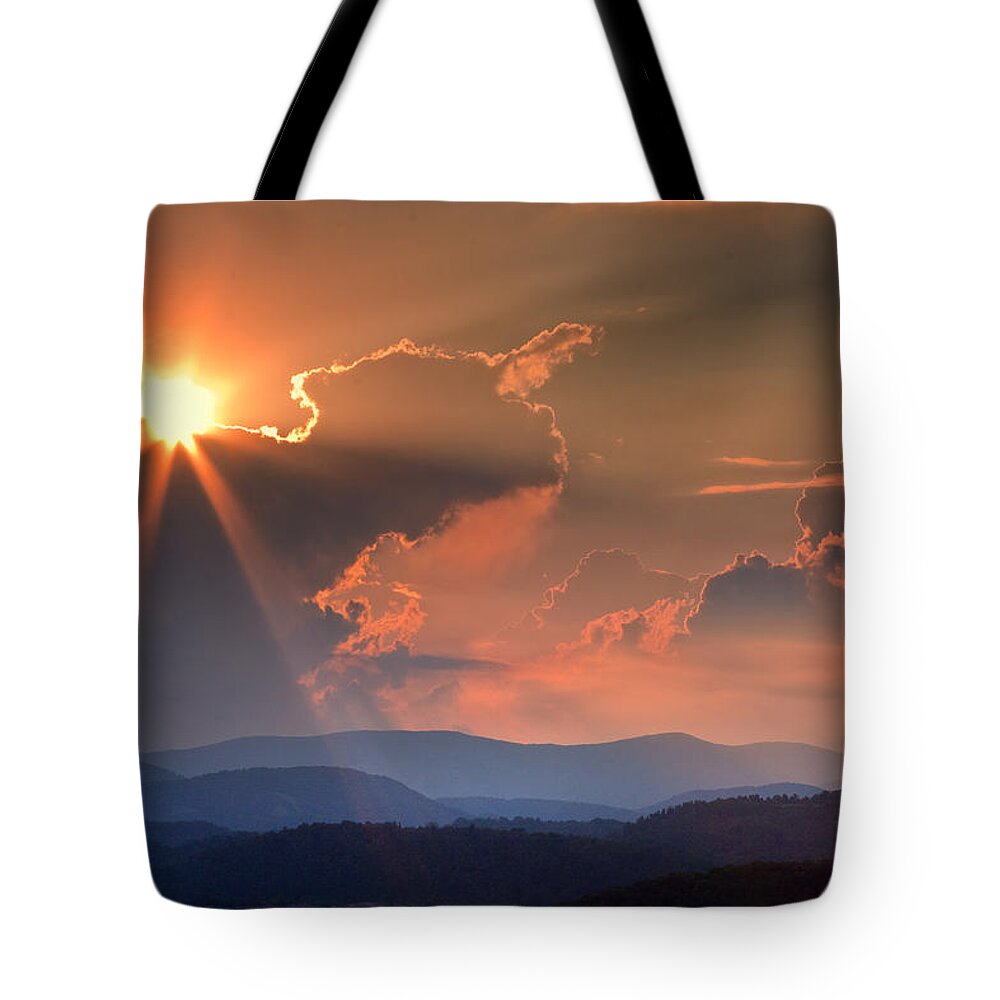 Sunset Tote Bag featuring the photograph God Rays over N C Mountains by Ken Barrett