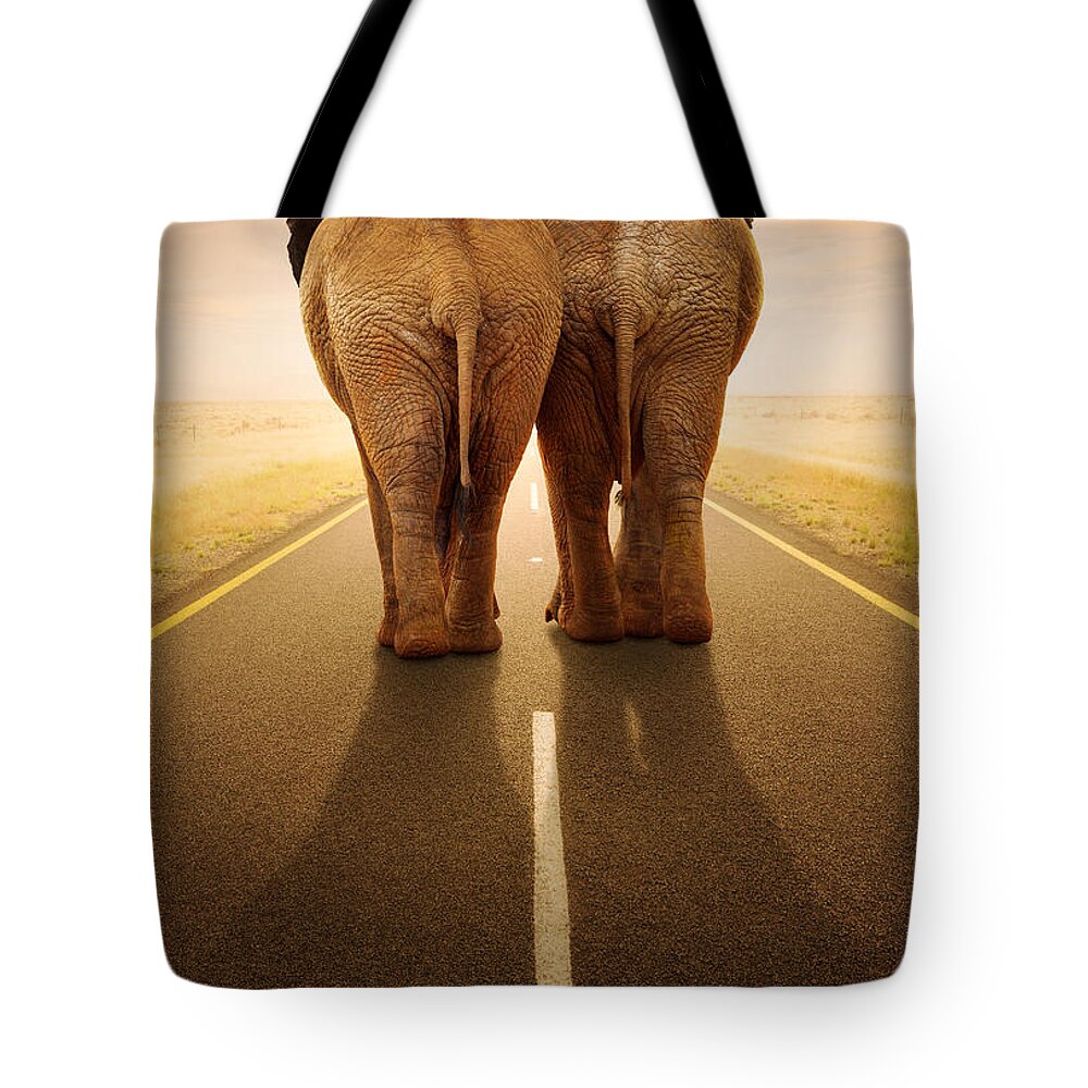 Elephant Tote Bag featuring the photograph Going away together / travelling by road by Johan Swanepoel