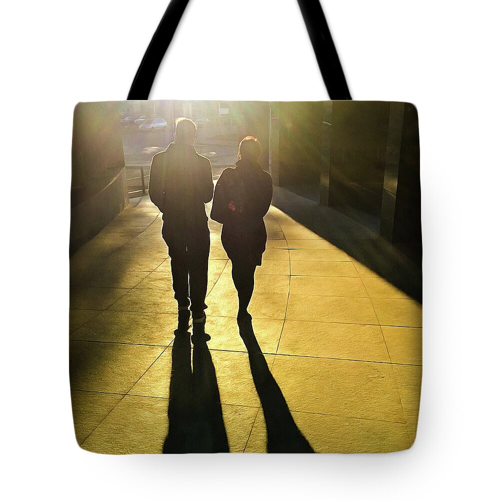 Shadow Tote Bag featuring the photograph Golden autumn light makes long shadows by Matthias Hauser