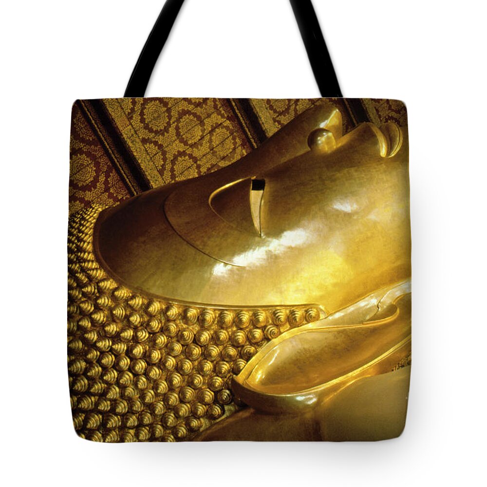 Buddha Tote Bag featuring the photograph Golden Buddha Face by Heiko Koehrer-Wagner