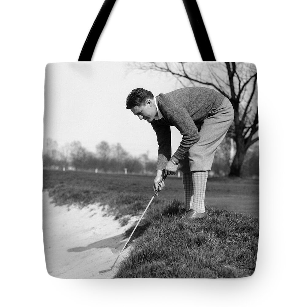 1930s Tote Bag featuring the photograph Golfer Playing Ball In Sand Trap by H. Armstrong Roberts/ClassicStock