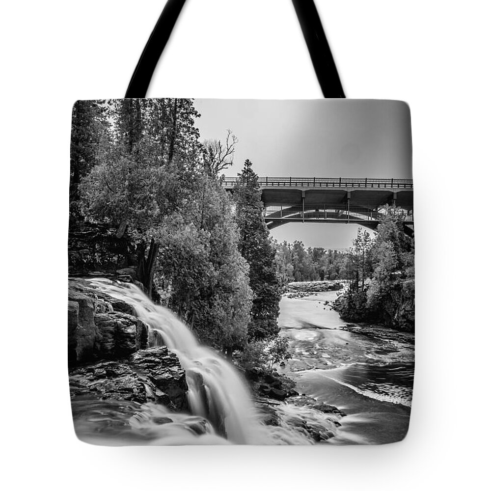 Upper Gooseberry Falls Tote Bag featuring the photograph Gooseberry Falls bridge in Black and white by Paul Freidlund