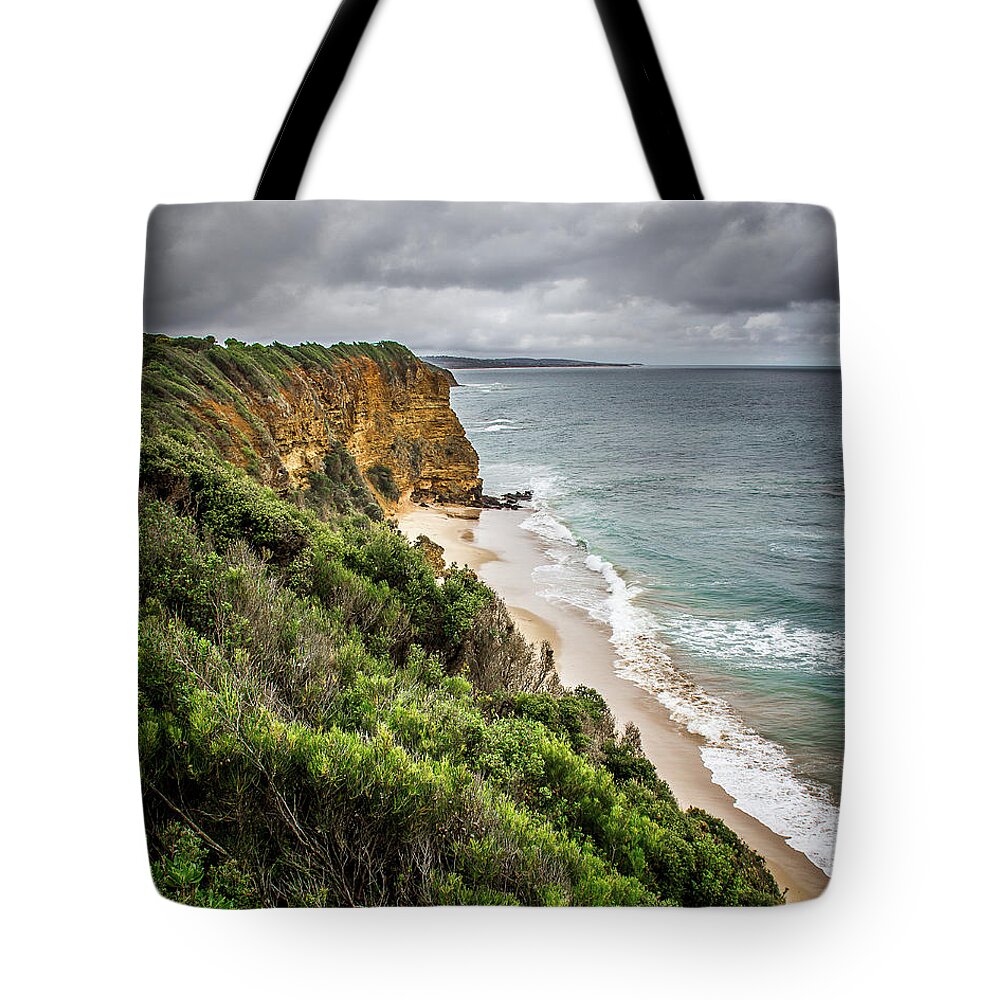Beach Tote Bag featuring the photograph Gray Skies by Perry Webster