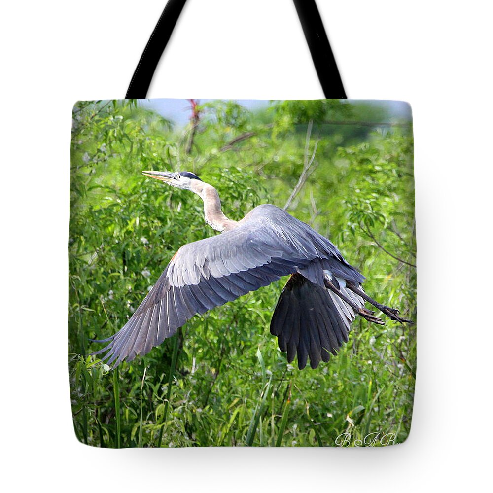 Great Blue Heron Tote Bag featuring the photograph Great Blue Heron Takeoff by Barbara Bowen