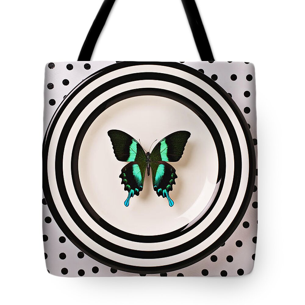 Butterfly Tote Bag featuring the photograph Green and black butterfly on plate by Garry Gay