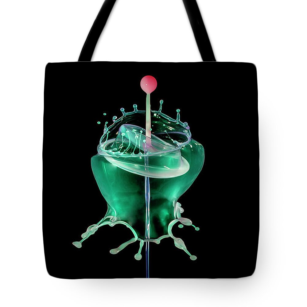 Waterdrop Tote Bag featuring the photograph Green liquid scuplture by Jaroslaw Blaminsky