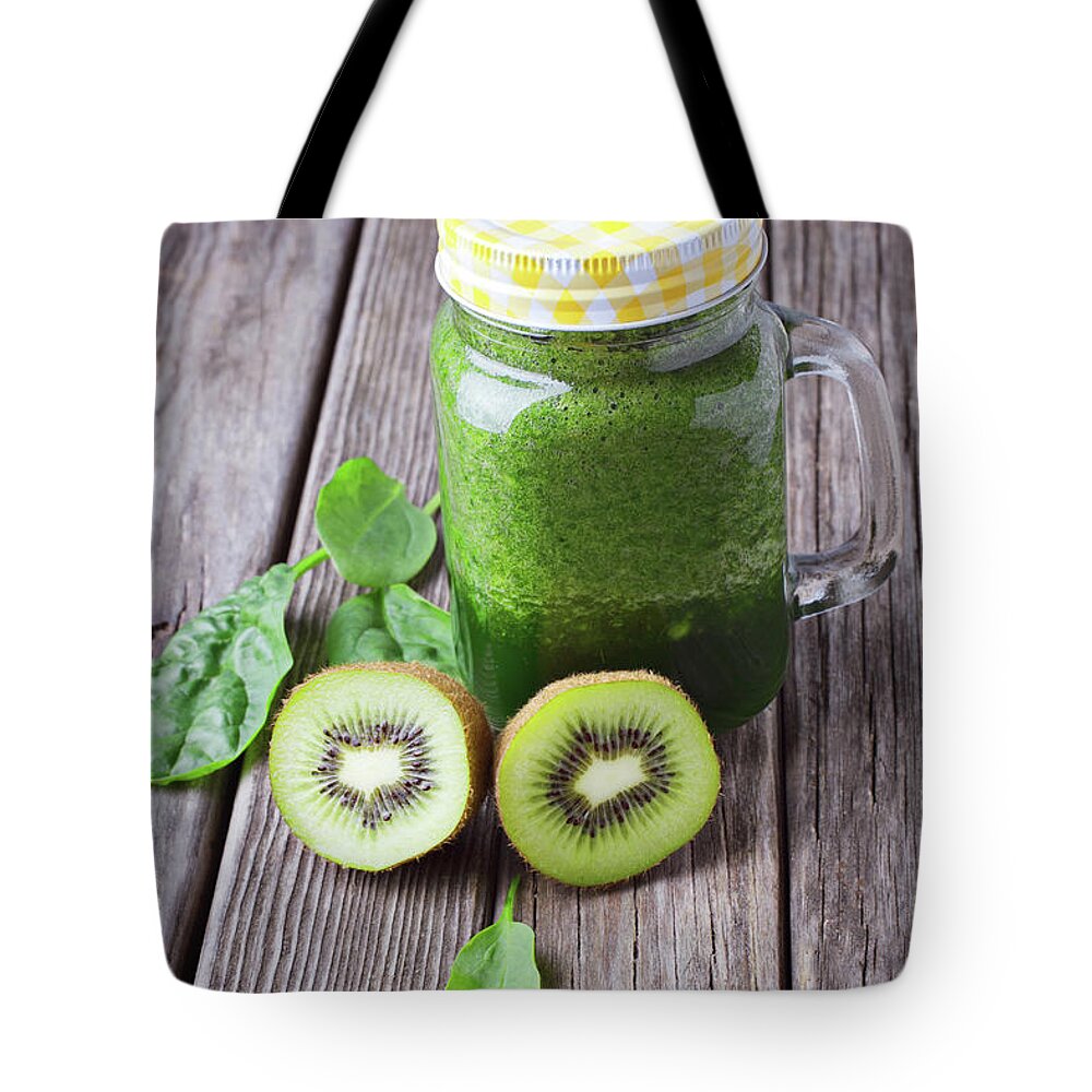 Background Tote Bag featuring the photograph Green smoothie by Tatiana Frank