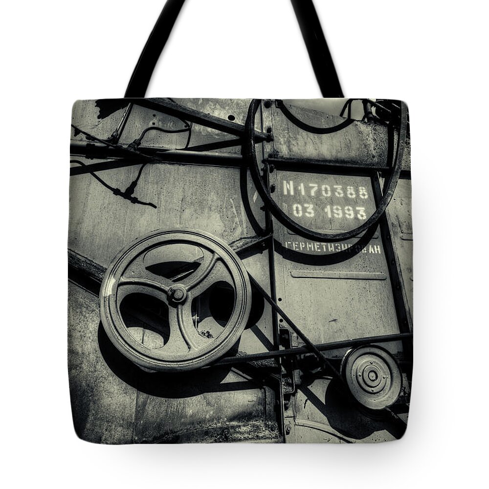 Combine Tote Bag featuring the photograph Grey Monstrosity by John Williams