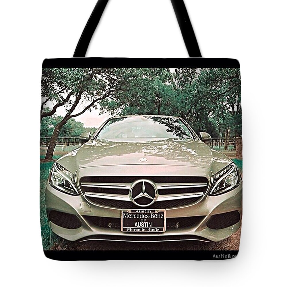 Keepaustinweird Tote Bag featuring the photograph #grey #sky And A #silver Grey #car by Austin Tuxedo Cat