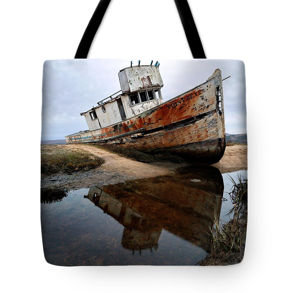 Grounded Tote Bag featuring the photograph Grounded by Nicholas Blackwell