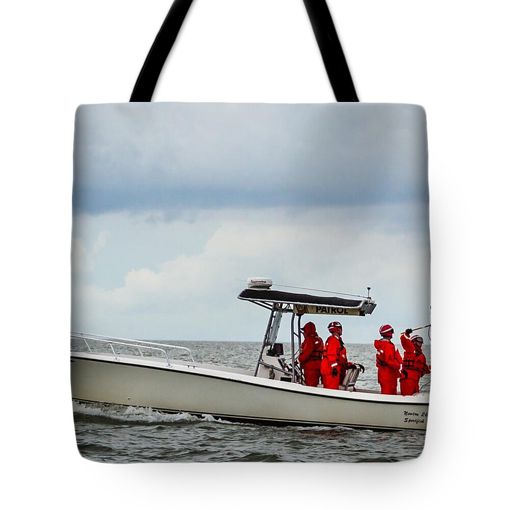 Us Coast Guard Tote Bag featuring the photograph Grounding the Rescue Basket by Gregory Daley MPSA