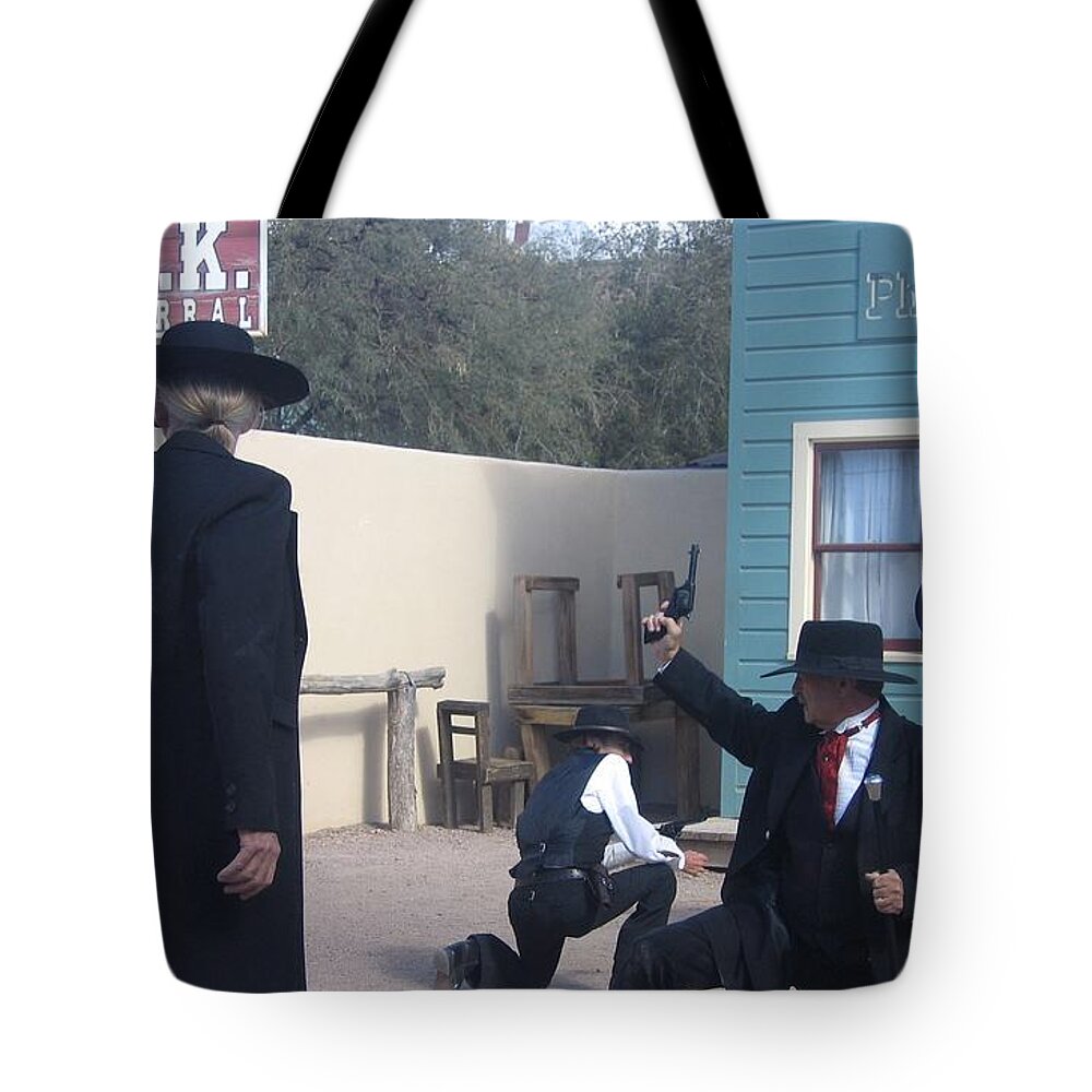 Gunfight Re-enactment O.k. Corral Tombstone Arizona 2004 Tote Bag featuring the photograph Gunfight re-enactment O.K. Corral Tombstone Arizona 2004 by David Lee Guss