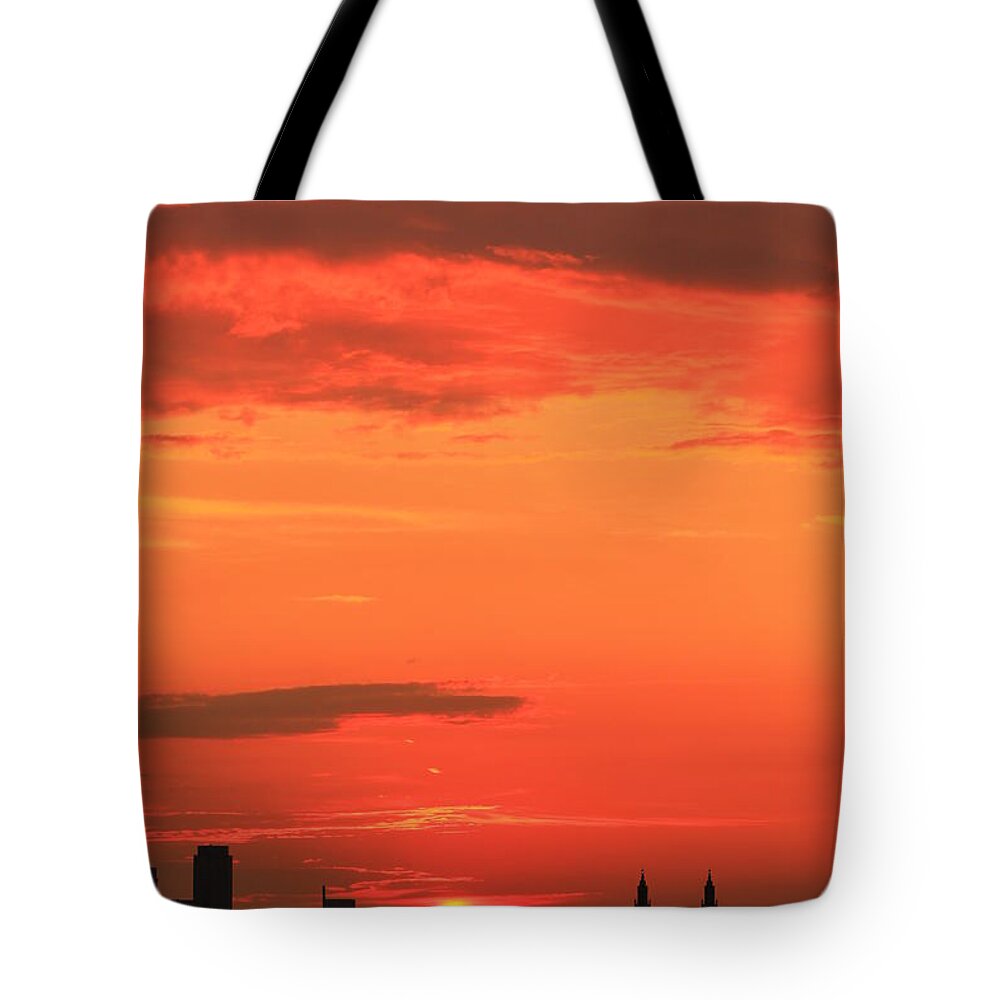 Sunset Tote Bag featuring the photograph Half an Orange Sun by Catie Canetti