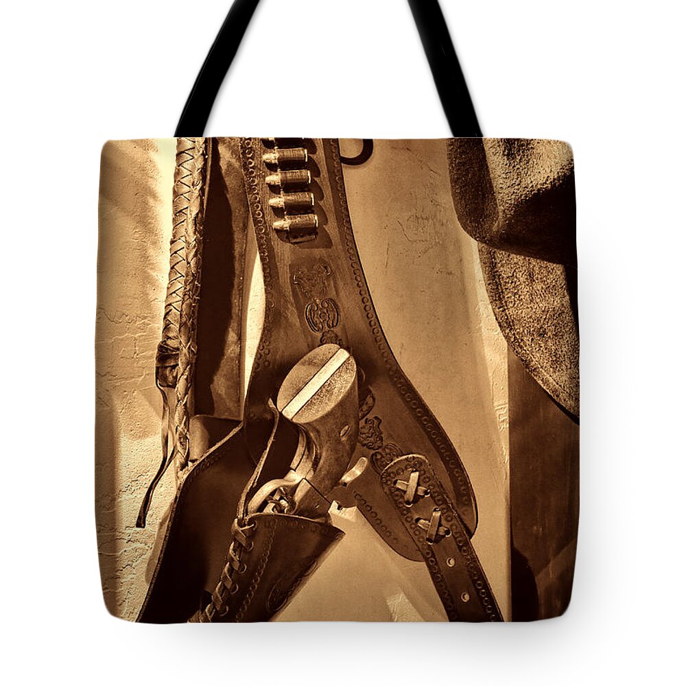 Gun Tote Bag featuring the photograph Hanging Revolver by American West Legend By Olivier Le Queinec