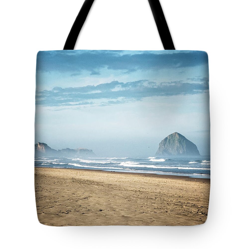 Oregon Coast Tote Bag featuring the photograph Haystack Rock Pacific City by Tom Singleton