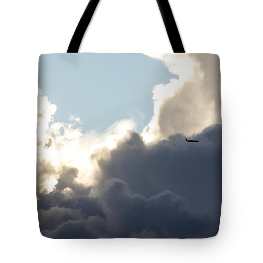 Travel Tote Bag featuring the photograph Head in the clouds by Matt McDonald