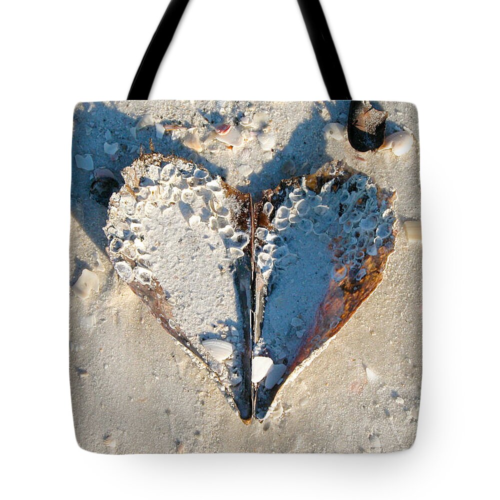 Heart Tote Bag featuring the photograph Heart on the Beach by Mike Evangelist