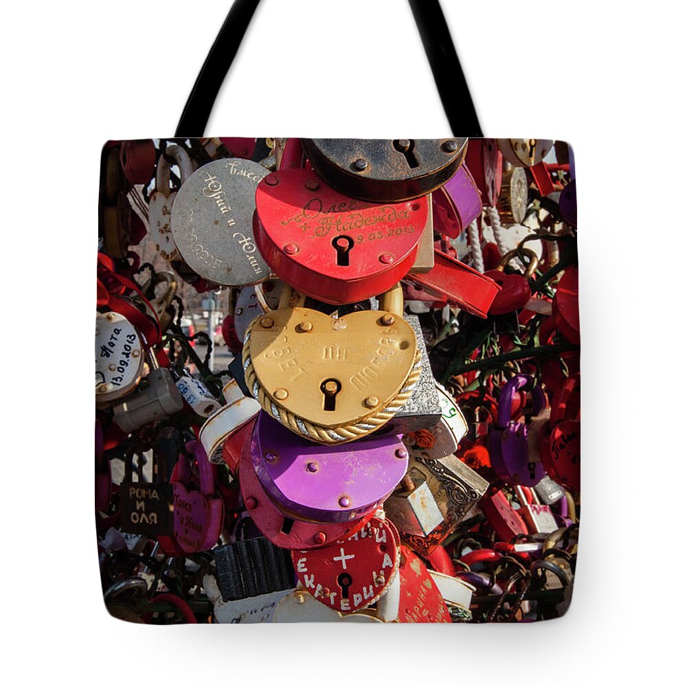 Lock Tote Bag featuring the photograph Hearts Locked in Love by Geoff Smith