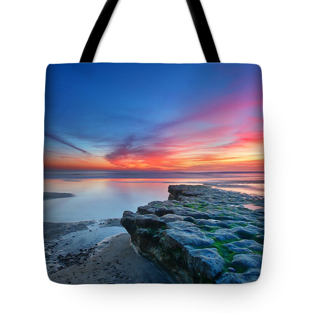 Sunset Tote Bag featuring the photograph Heaven and Earth by Larry Marshall