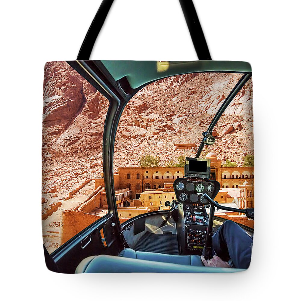 Mount Sinai Tote Bag featuring the photograph Helicopter on Monastery of St Catherine by Benny Marty