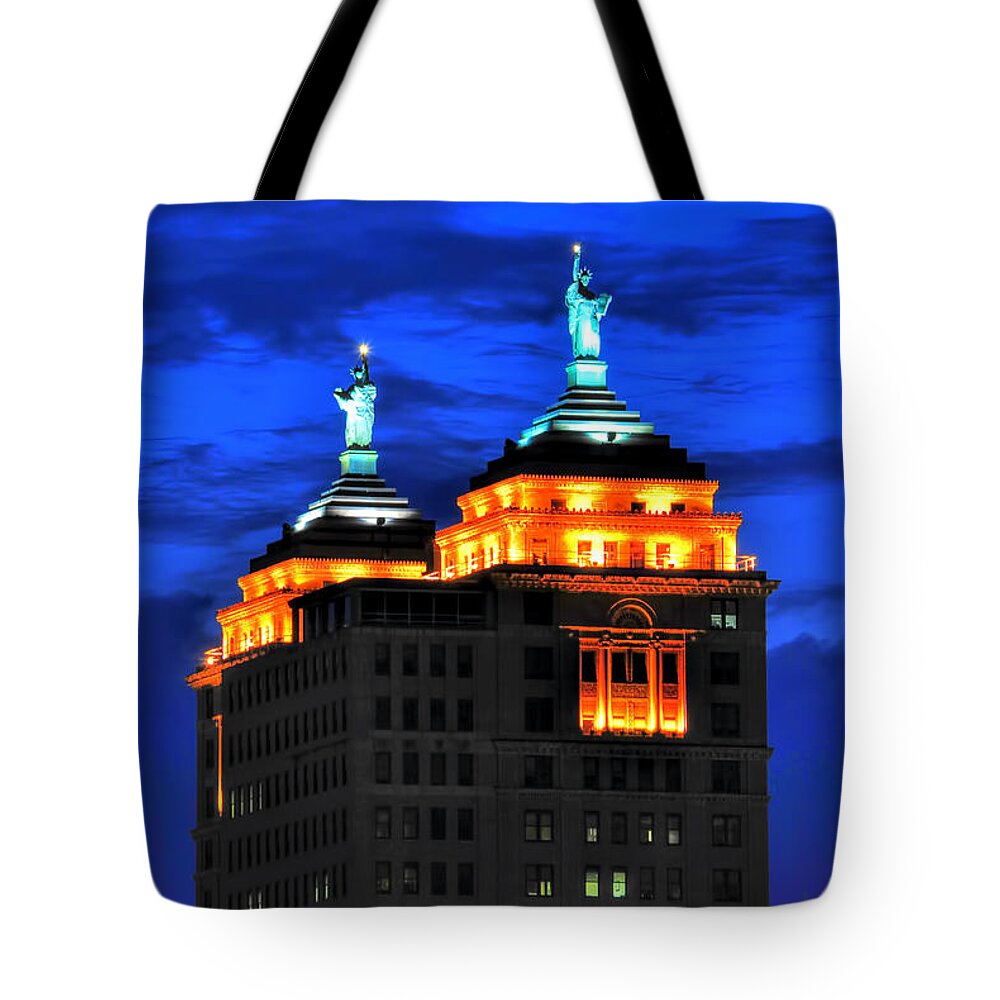  Tote Bag featuring the photograph Hello Goodbye in Stormy Skies Atop the Liberty Building by Michael Frank Jr