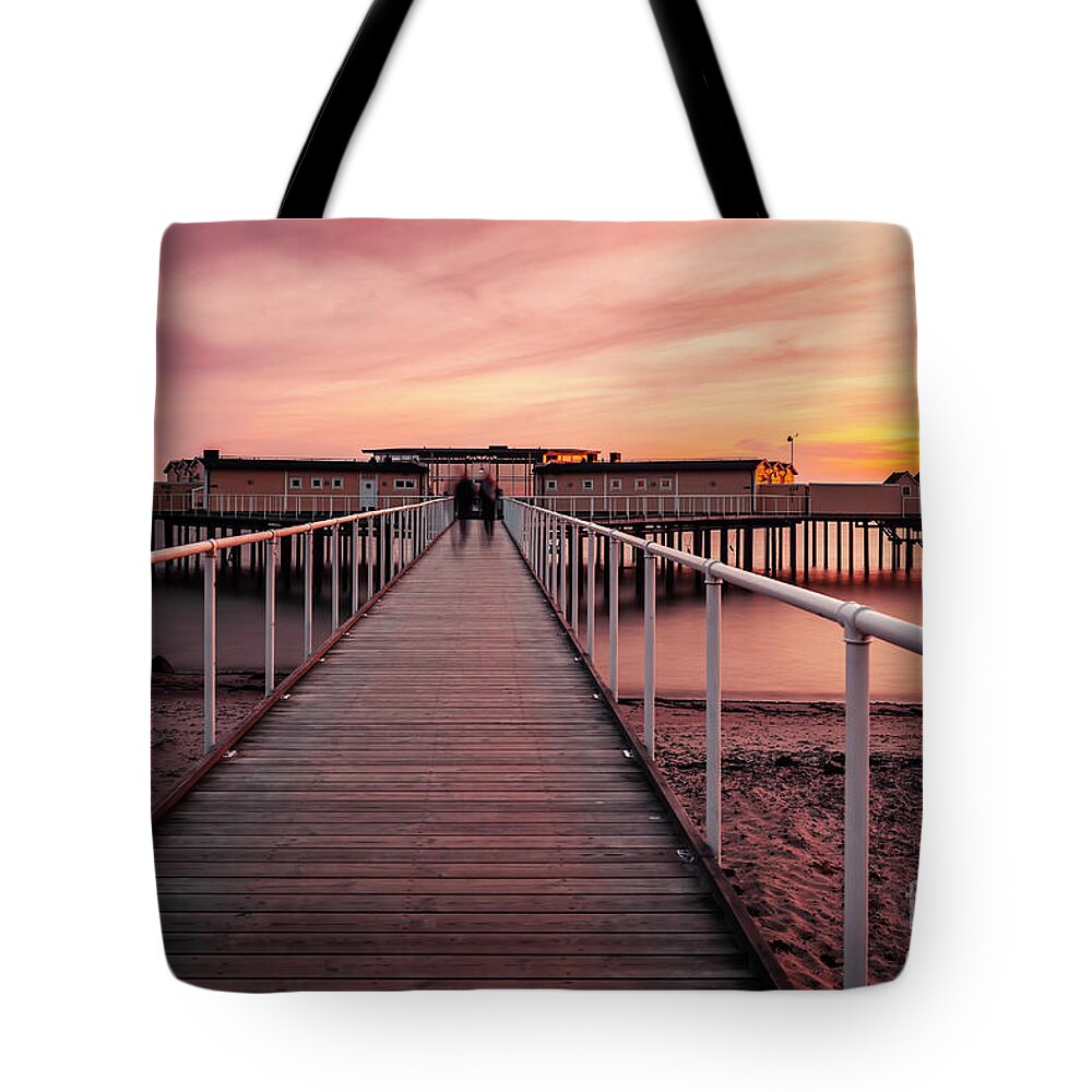 Palsjo Tote Bag featuring the photograph Helsingborg pier at sunset by Sophie McAulay
