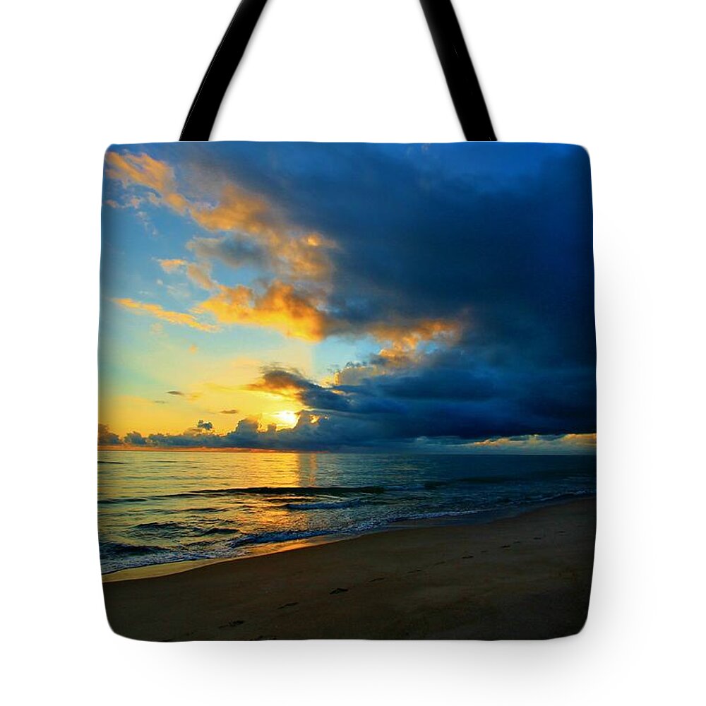 Jupiter Tote Bag featuring the photograph Here Comes the Rain by Catie Canetti