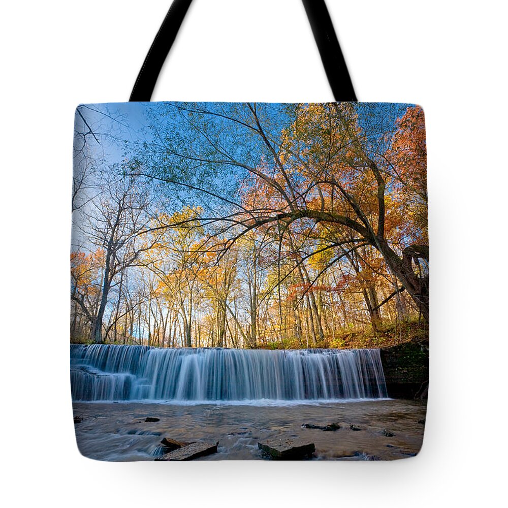 Autumn Tote Bag featuring the photograph Hidden Falls in Autumn at full flow by Rikk Flohr