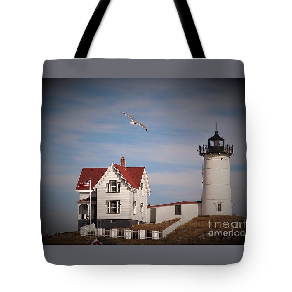 Lighthouse Tote Bag featuring the photograph Highlighting the Nubble Light by Loretta Pokorny