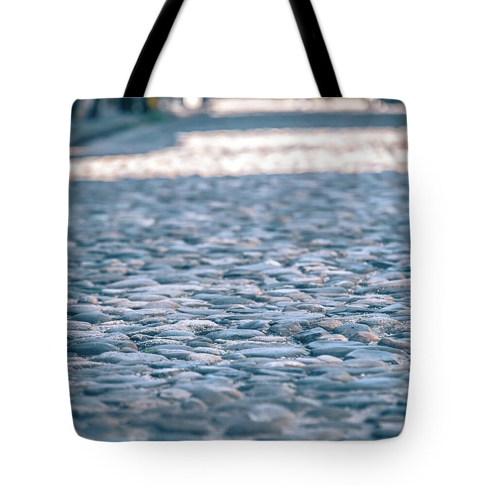 Background Tote Bag featuring the photograph Historic Old River Rock Stone Paveres On Old Street by Alex Grichenko