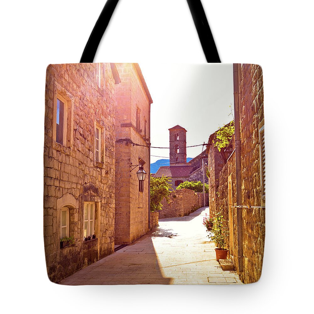 Ston Tote Bag featuring the photograph Historic town of Ston street and church view by Brch Photography