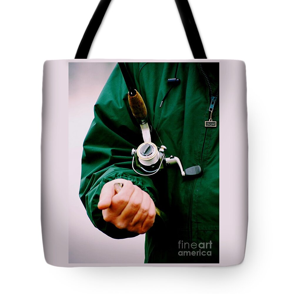 Midwest Tote Bag featuring the photograph Holding A Fish by Frank J Casella
