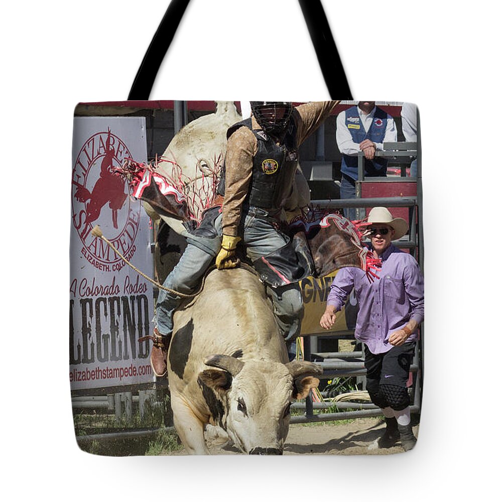 Rodeo Tote Bag featuring the photograph Holding On by Steven Parker
