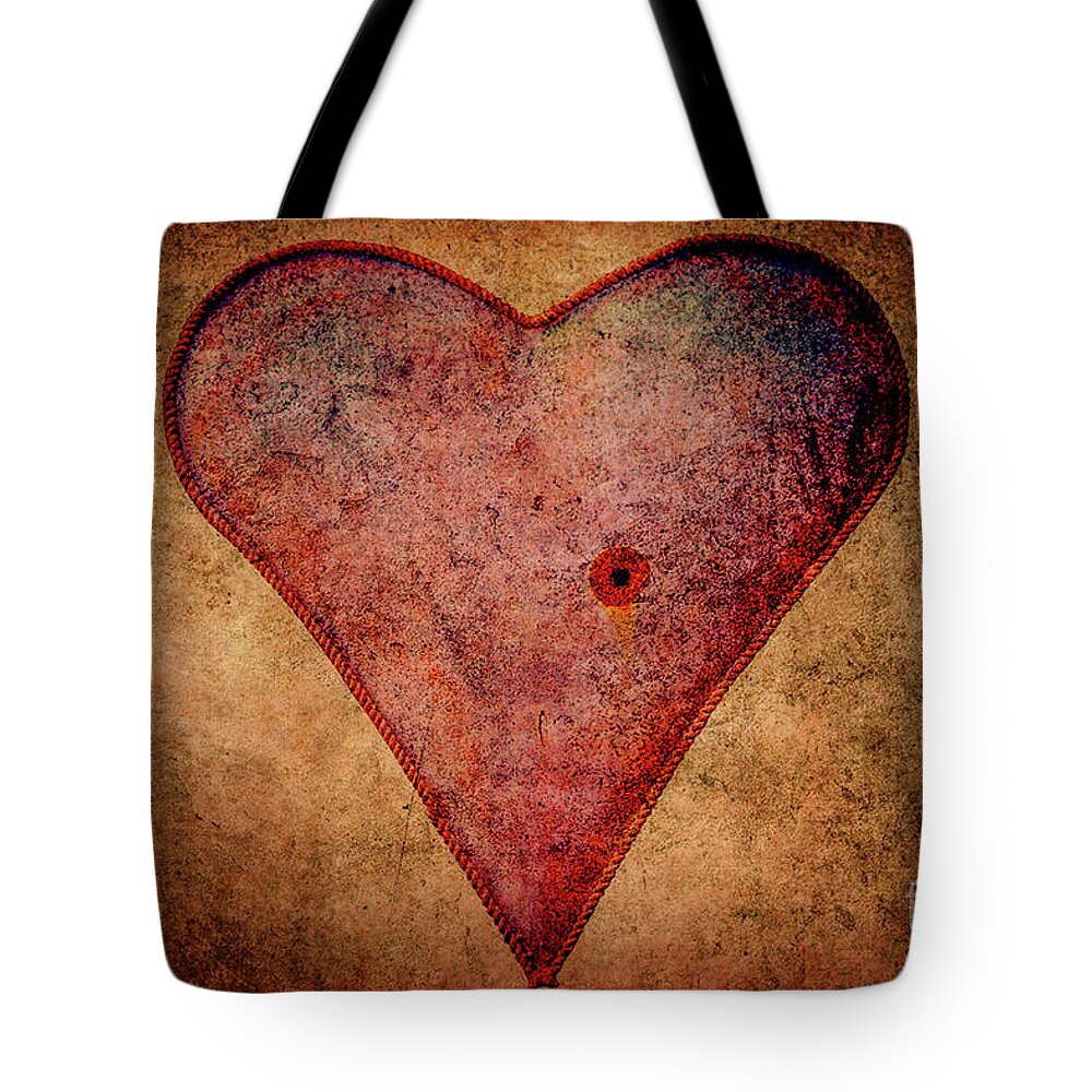 Hole In The Tin Mans Heart Tote Bag featuring the digital art Hole in the Tin Mans Heart by Randy Steele