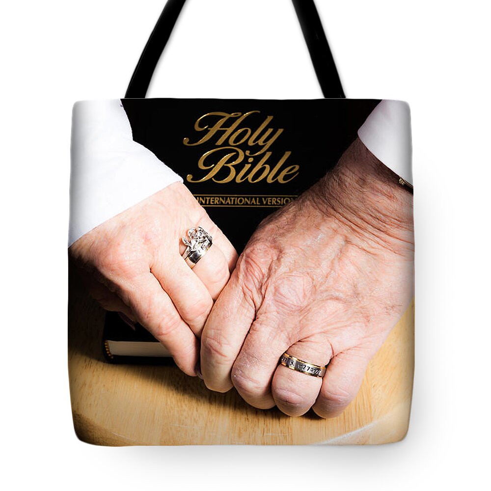 Celebration Tote Bag featuring the photograph Holy Bible by Lawrence Burry